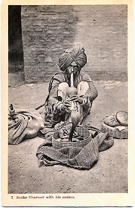 Indian-Snake-Charmer-With-Snakes.jpg